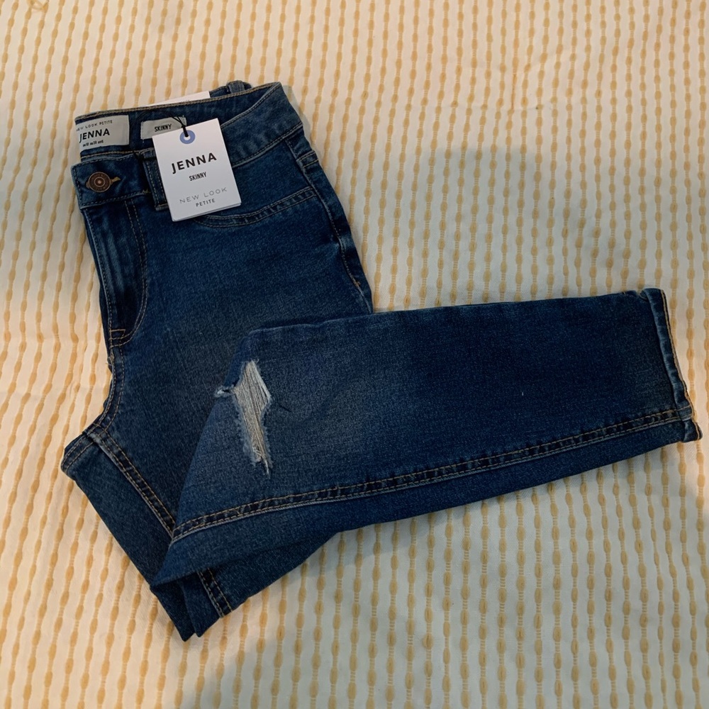 NTW RIPPED KNEE JEANS
